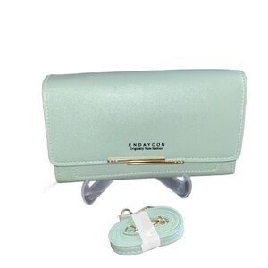 Mint Green Crossbody w/ adjustable strap. PU/Faux Leather New in package